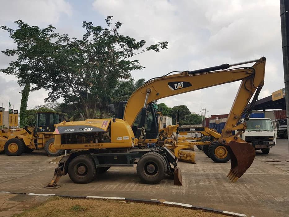 Cat 318 Tyred Ekscavator